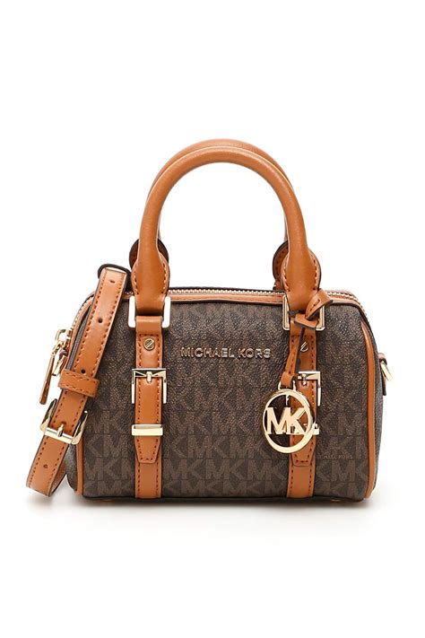 coach or michael kors bags|michael kors bags official website.